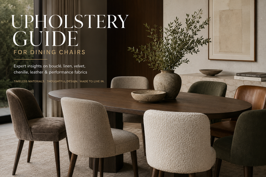 Luxury dining room featuring upholstered dining chairs in bouclé, linen, leather and velvet around a solid wood table, illustrating how to choose the best upholstery for dining chairs.