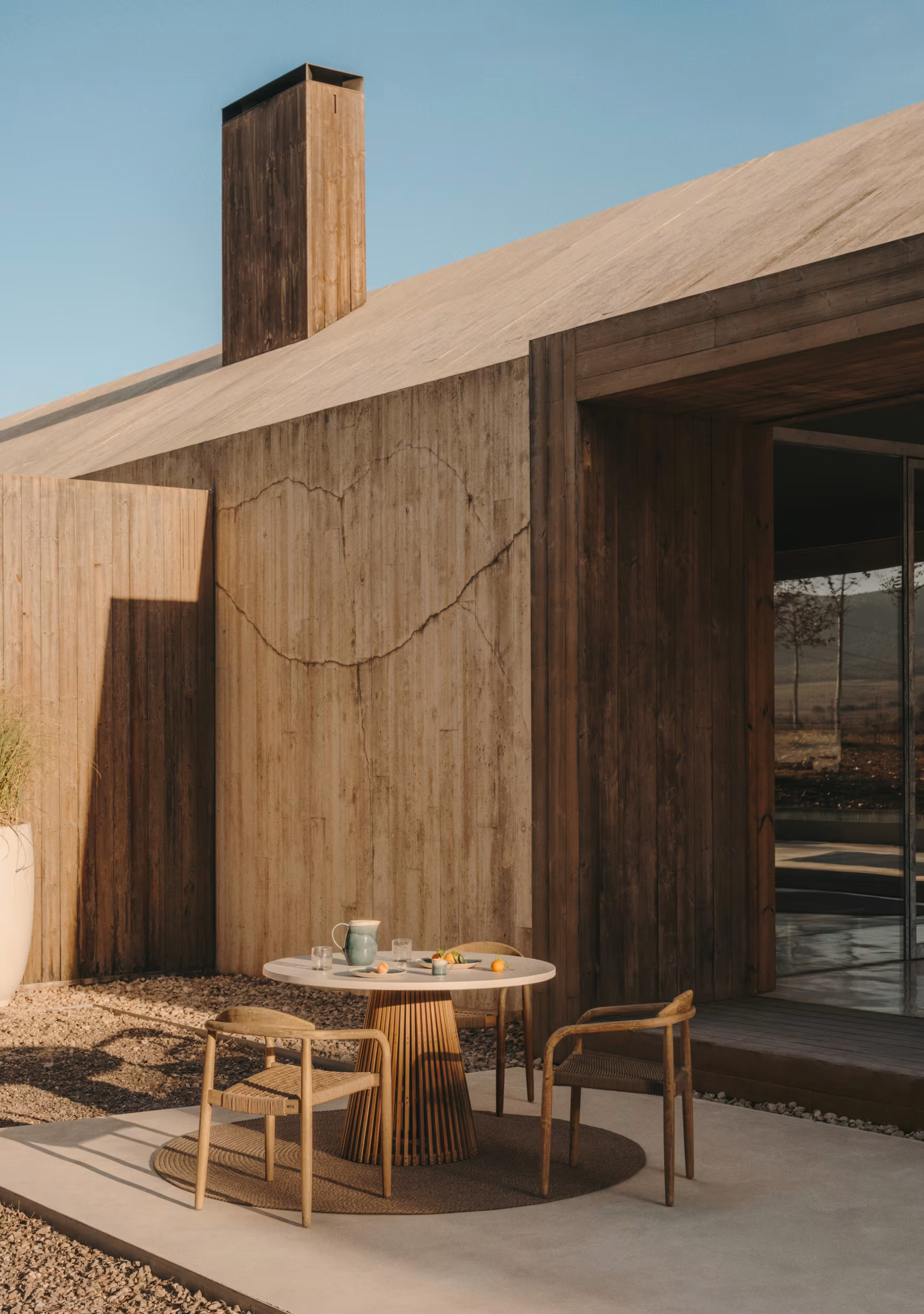 FSC® certified acacia stackable chair with woven beige rope – Elara Maison™ design.